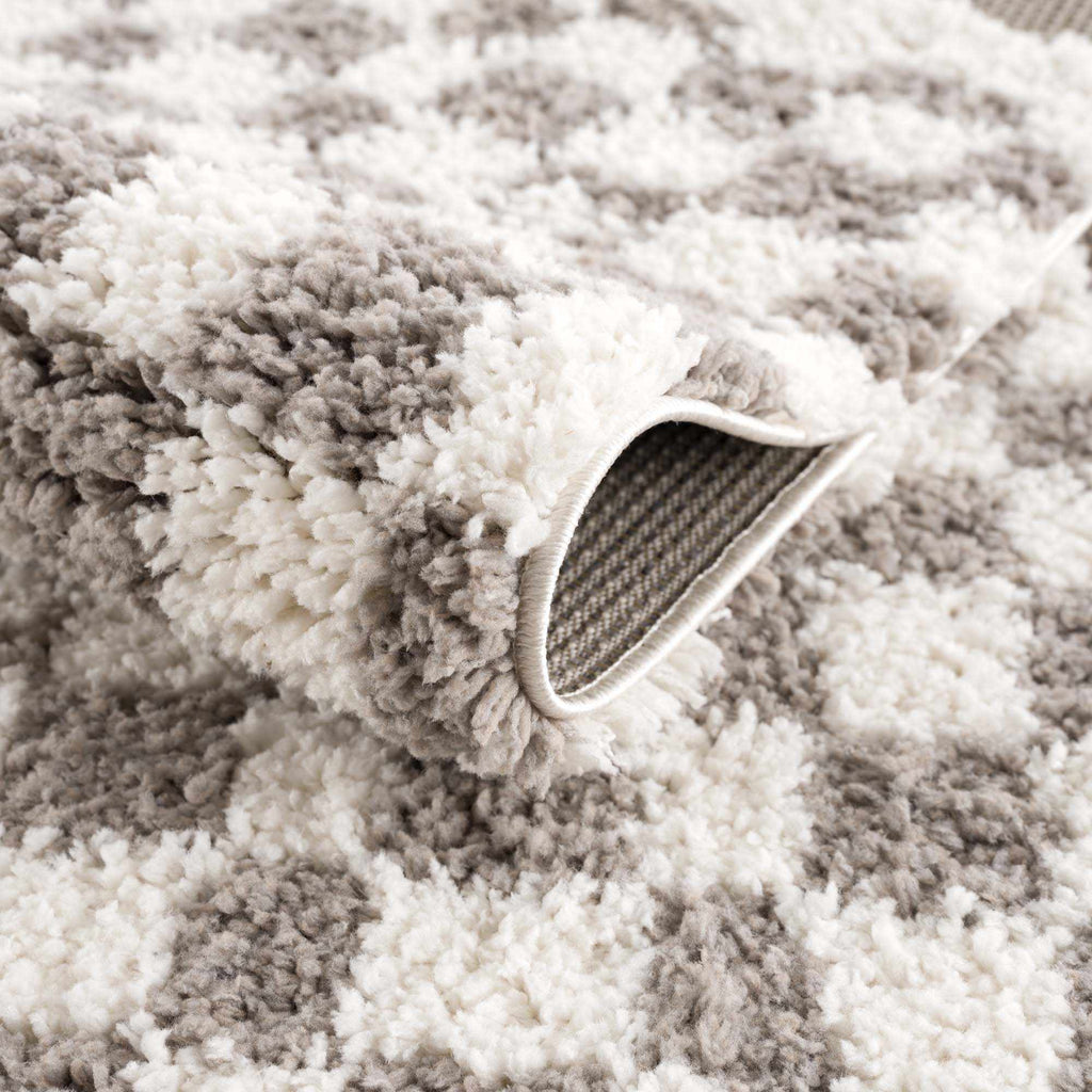 Kieu Taupe Checkered Area Rug